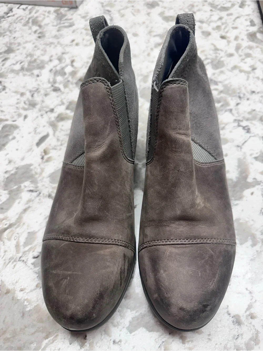 Sorel Evie II Chelsea waterproof boots in a gray leather and suede finish.